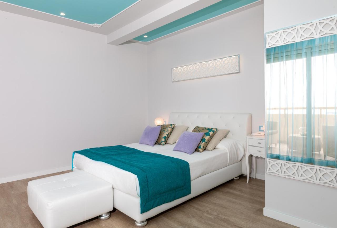 Junior Suite with Balcony Side Sea View,1001362848:JPEG